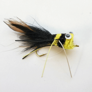 lack and yellow deer hair bass bug popper fly for topwater fishing